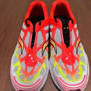 Flame colored Saucony mens or women’s shoes.